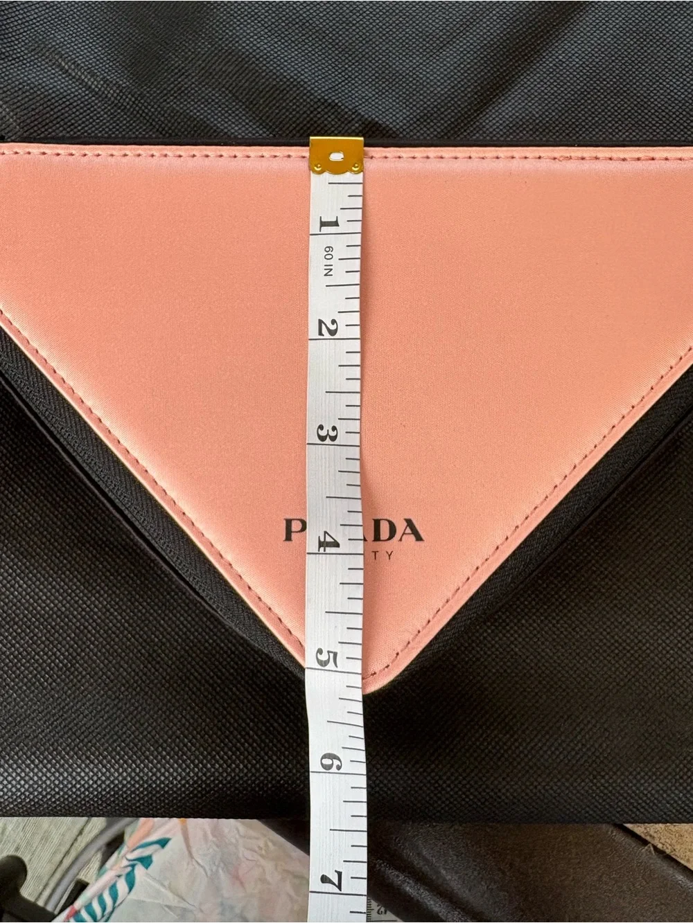 Pink Triangular Cosmetic Pouch with Black Trim